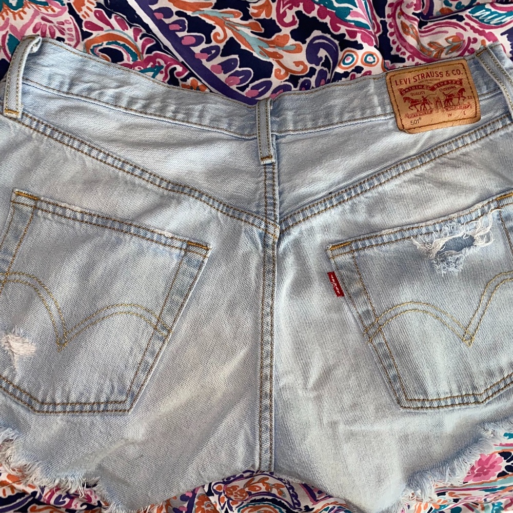 Ripped Levi's shorts